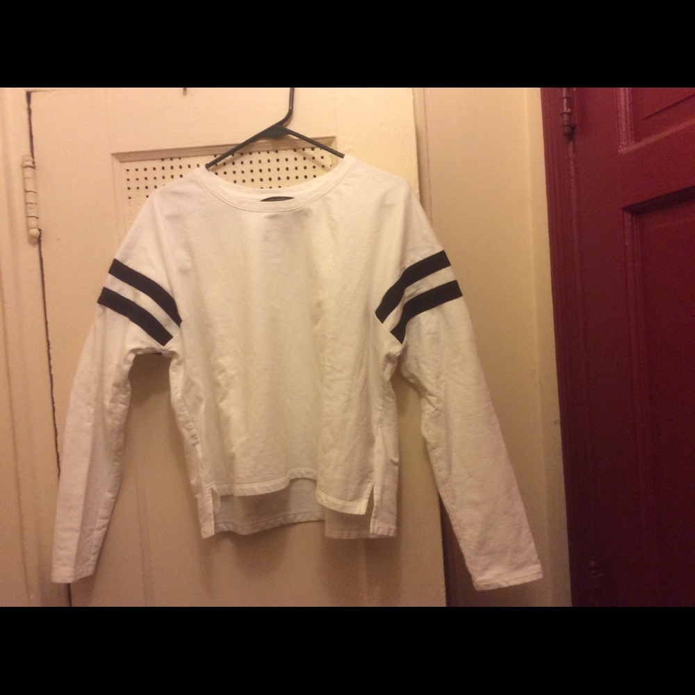 White long sleeve casual top with two black strip.